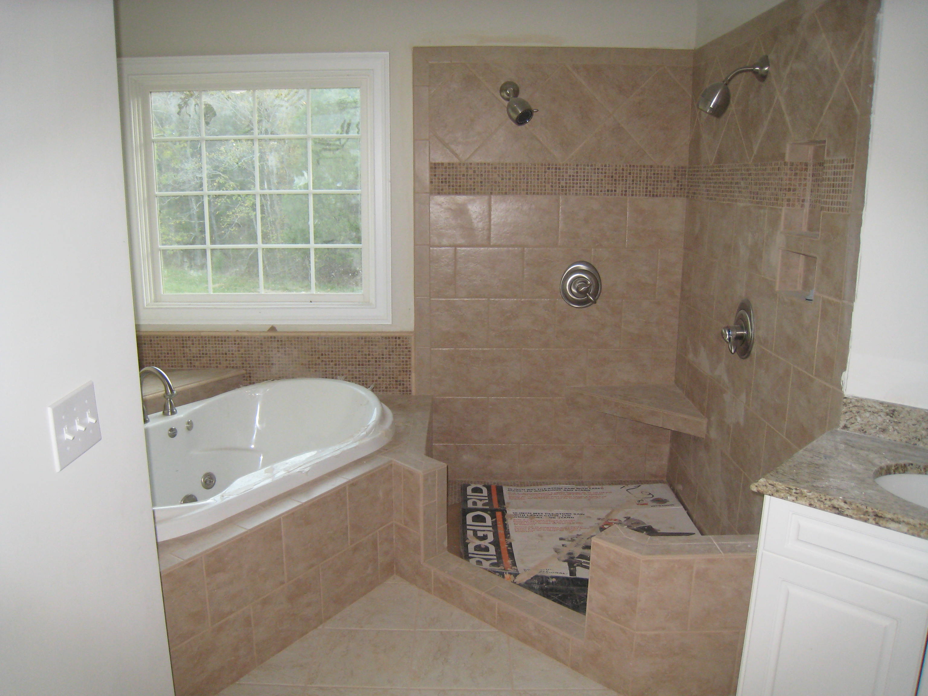 Custom bathtub and shower installations finished by home remodeling company Hedrick Creative Building, LLC in Lexington, NC